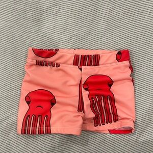 Hugo loves tiki swim trunks